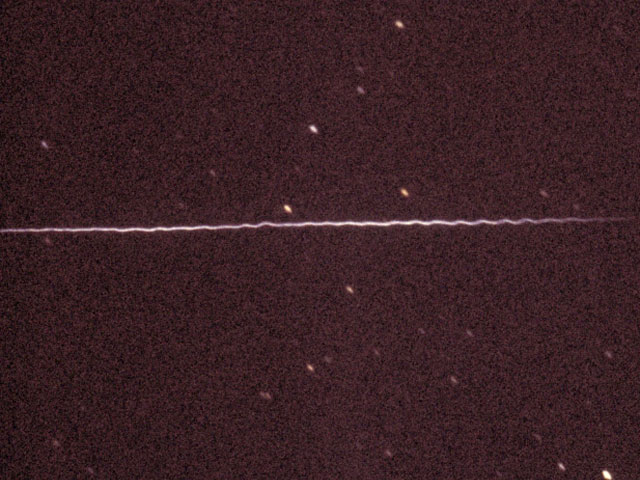 zkřivená dráha meteoru