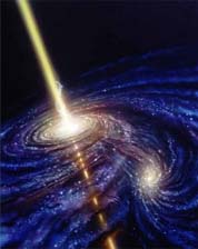 schema kvazaru: Vidíme akreční disk kolem černé díry, do něhož padá okolní hmota a výtrysky relativistických částic od pólů. Jejich délka může být několik mil. světelných roků. (kresba Don Dixon)